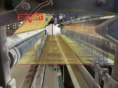 Dispositif de fil de chaîne